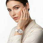 Studio portrait with hand near face