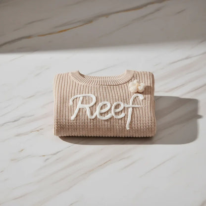 Sweater folded on marble