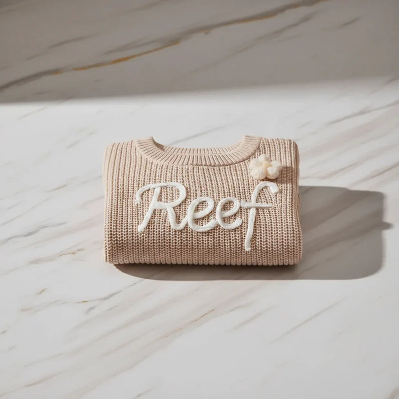 Sweater folded on marble