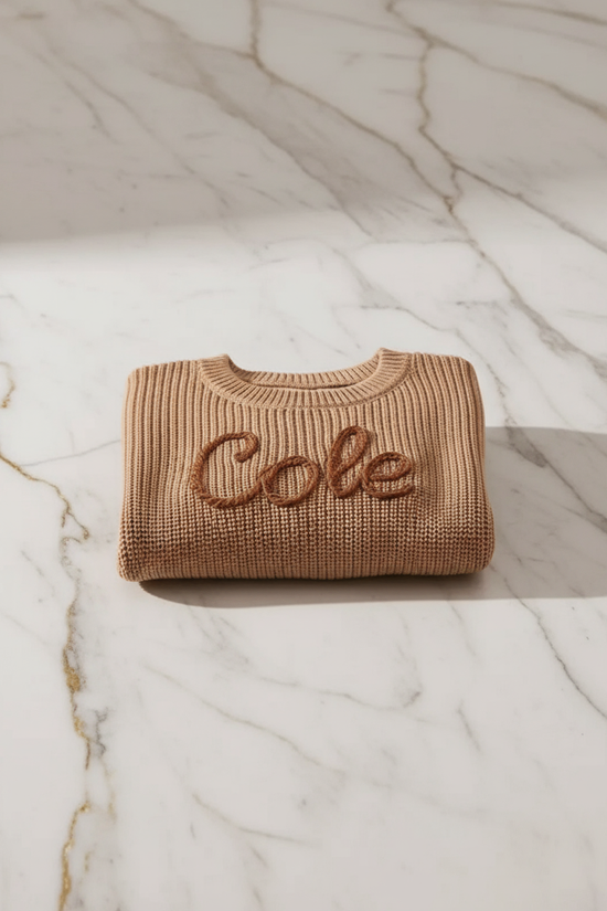 Sweater folded on marble