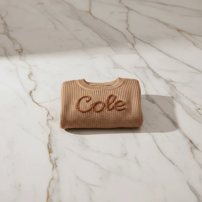 Sweater folded on marble