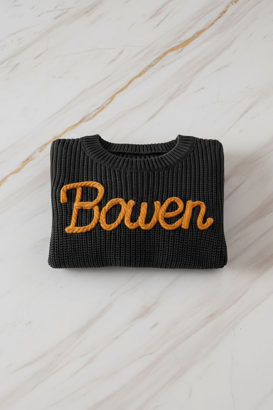 Sweater folded on marble