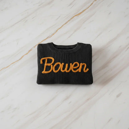 Sweater folded on marble