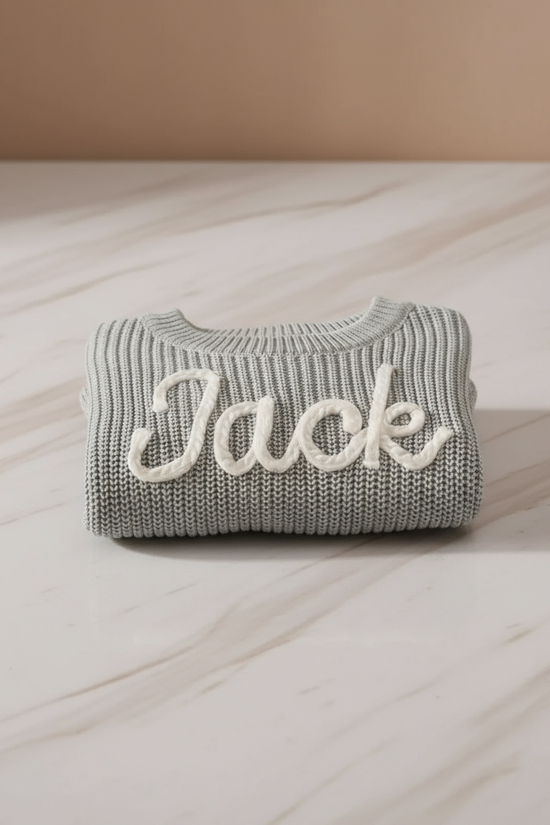 Sweater folded on marble