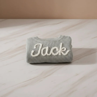 Sweater folded on marble