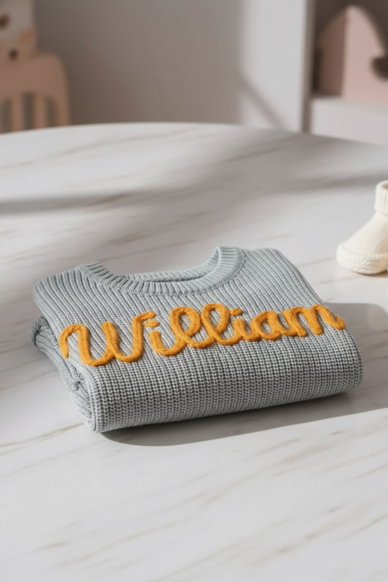 Sweater folded on marble