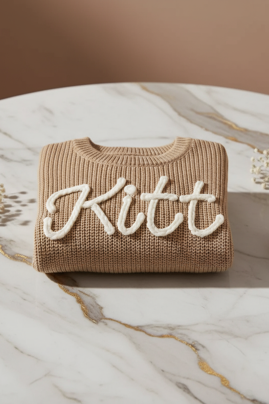 Sweater folded on marble