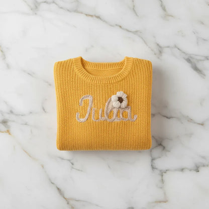 Sweater folded on marble