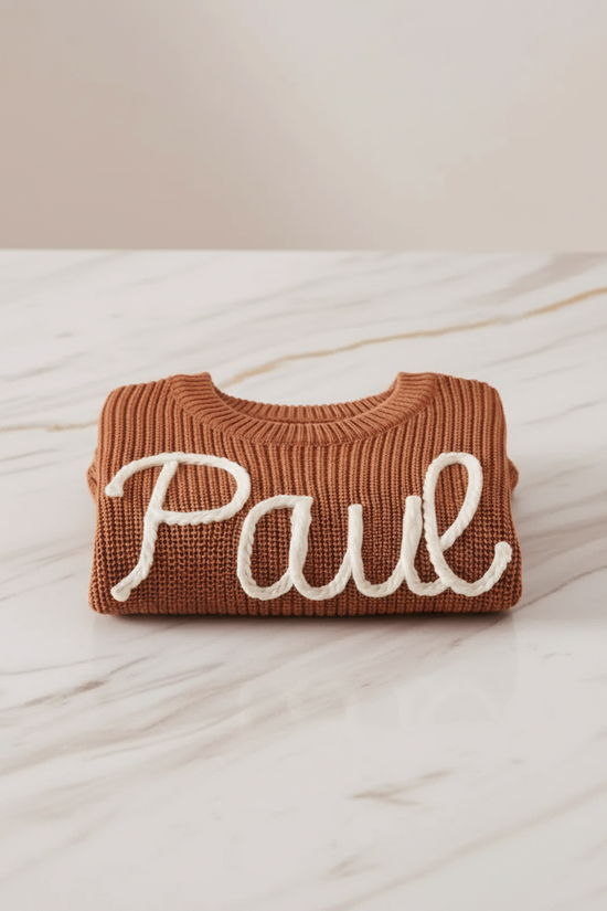 Sweater folded on marble