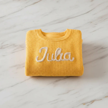 Sweater folded on marble