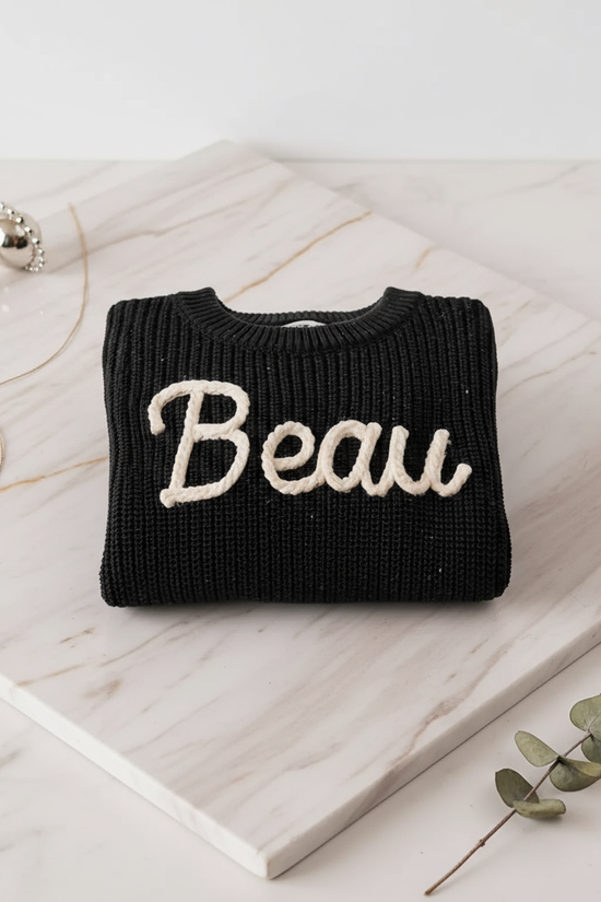 Sweater folded on marble