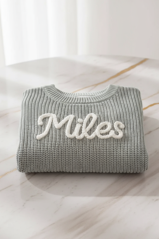 Sweater folded on marble