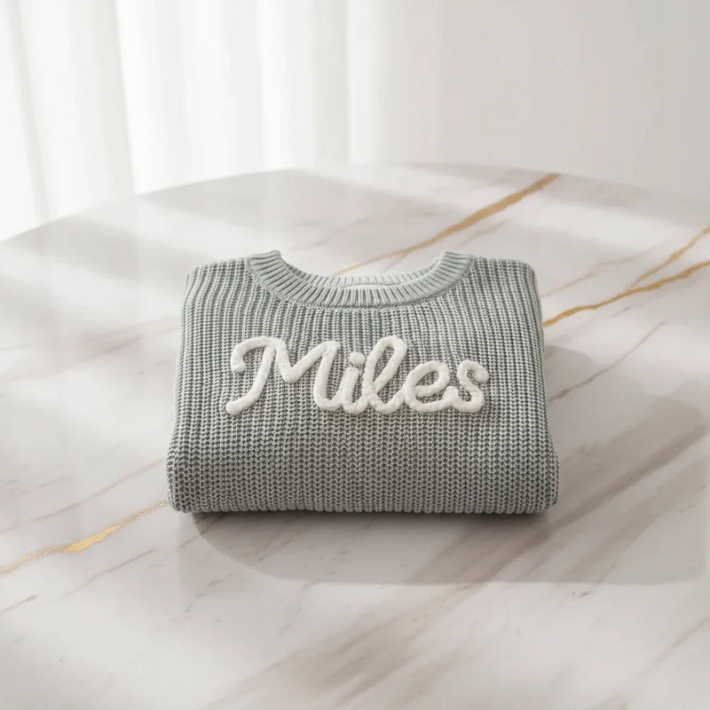 Sweater folded on marble