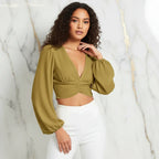 Three-quarter angle with different model in white pants