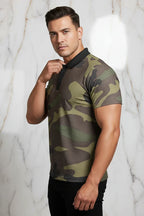 Man wearing a camouflage print polo shirt with black collar, stylish mens fashion at Ivorynn