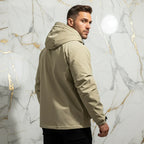 Three-quarter back angle - athletic man in khaki jacket