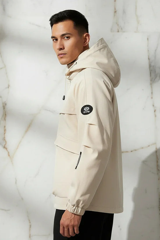 Three-quarter back angle - sporty man in off-white jacket