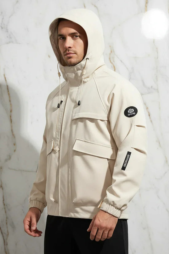 Three-quarter front angle - sporty man in off-white jacket