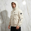 Three-quarter front angle - sporty man in off-white jacket