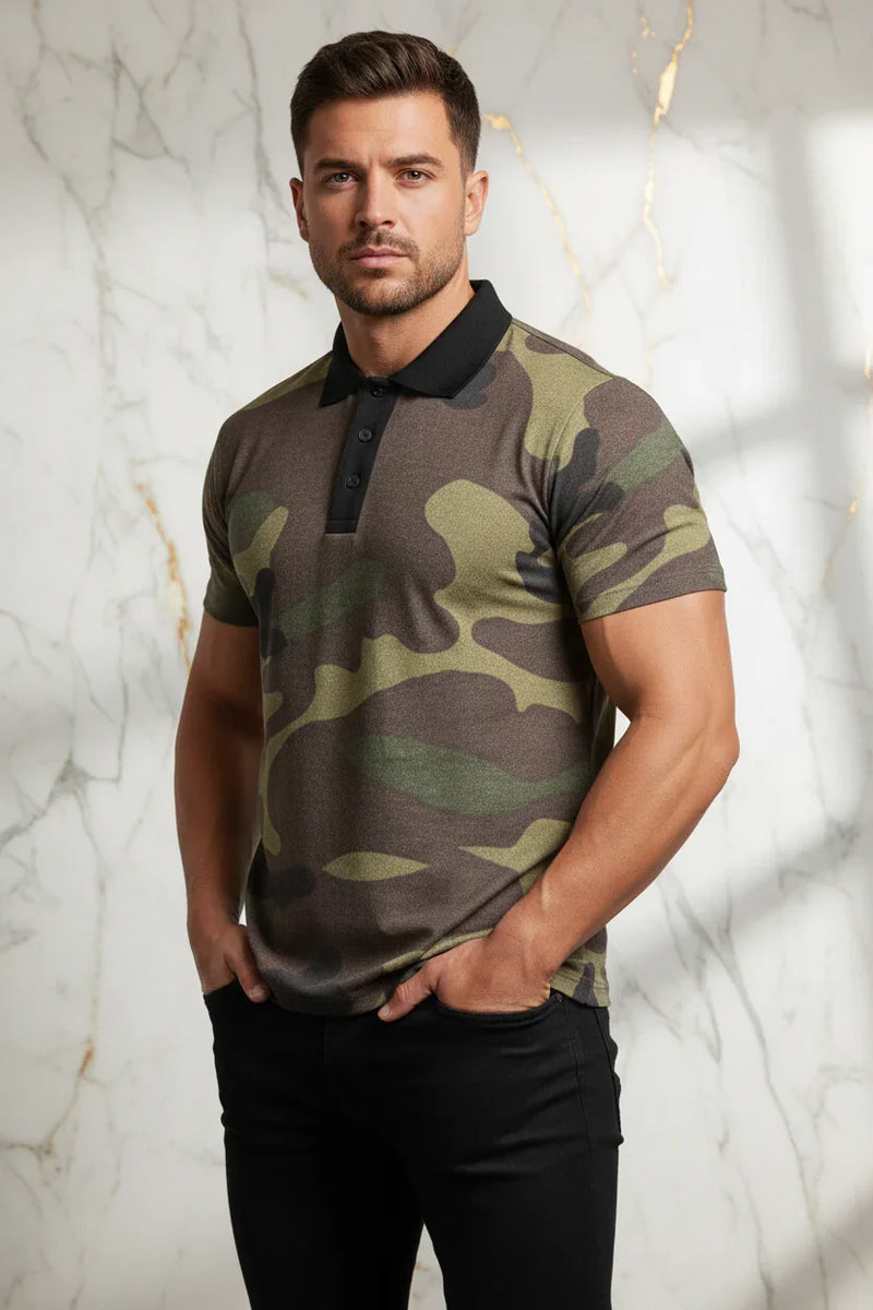 Man wearing a camouflage polo shirt and black pants, stylish men’s fashion from Ivorynn
