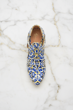 Top-down flat lay luxury heel