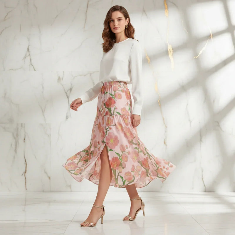 Stylish woman in white blouse and floral pink skirt with heels, Ivorynn fashion apparel