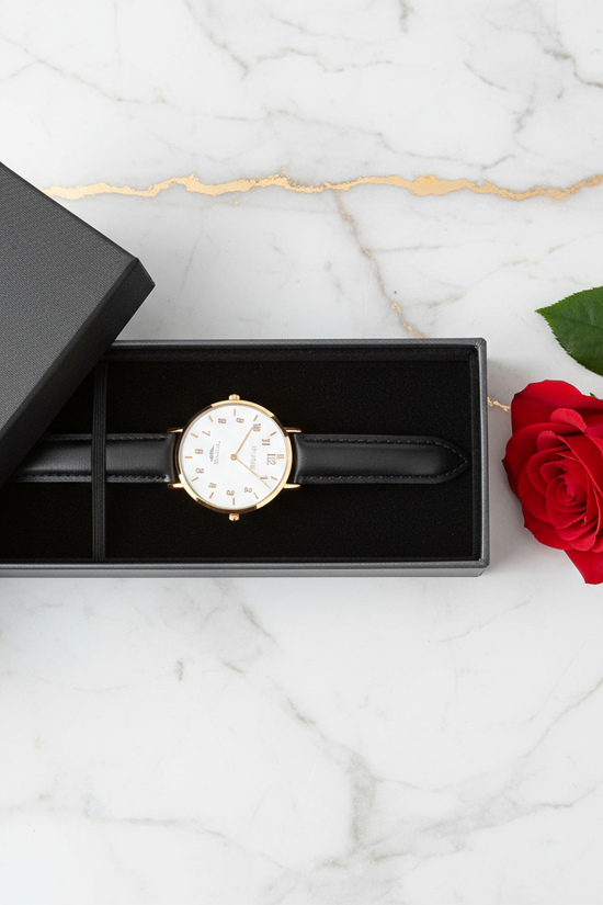 Watch in box with rose - overhead view