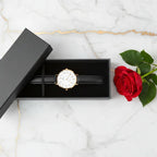 Watch in box with rose - overhead view