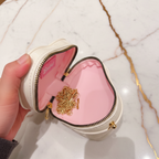 White bag opened by hand - marble background