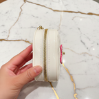 White bag side by hand - marble background