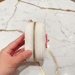 White bag side by hand - marble background