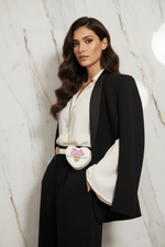 White bag - three quarter black blazer