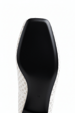 White Sandal Black Sole Close-up