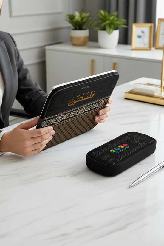Woman at desk with tablet sleeve - overhead view