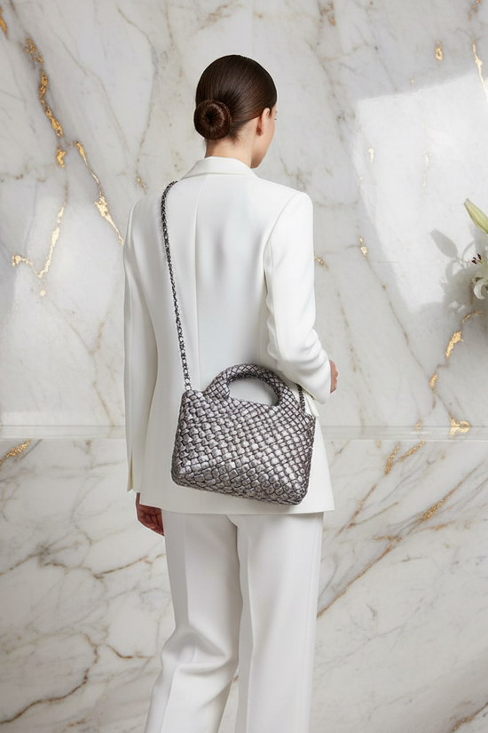 Woman Carrying Bag - Back View