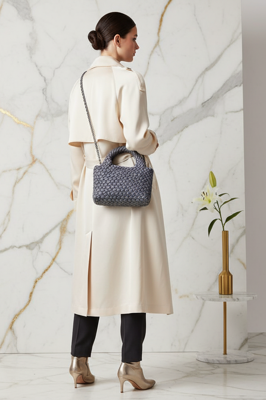 Woman Carrying Bag - Back View