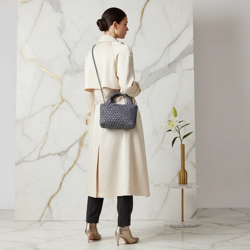 Woman Carrying Bag - Back View