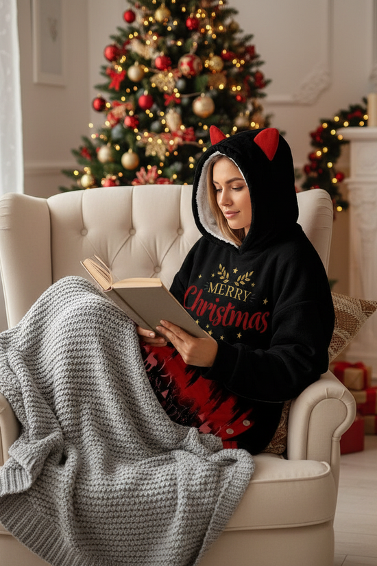 Woman cozy in armchair with book