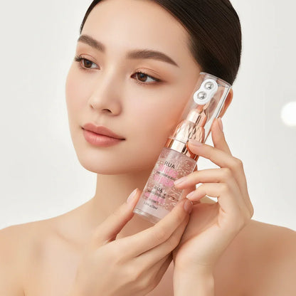 Woman displaying eye cream at eye level