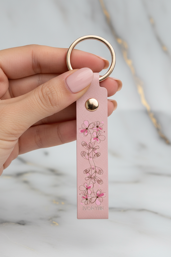 Woman holding keychain - close-up detail