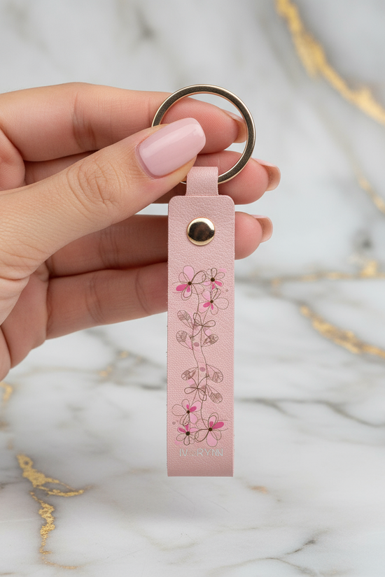 Woman holding keychain - front view