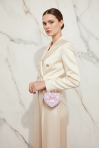 Woman holding mini bag - Heart Barbie Bag