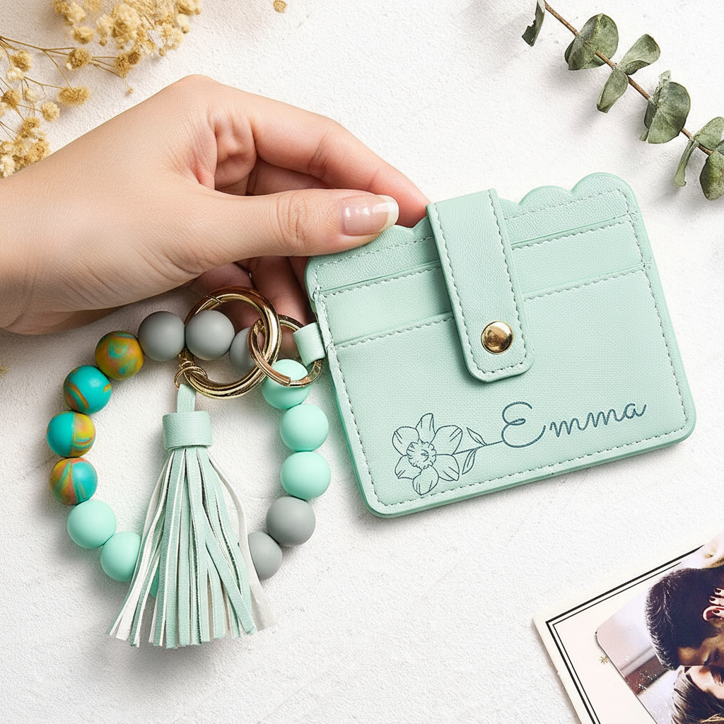 Woman holding mint green wallet