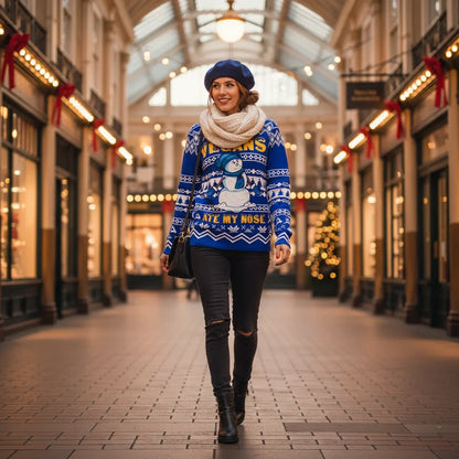 Woman in Christmas sweater in Covent Garden