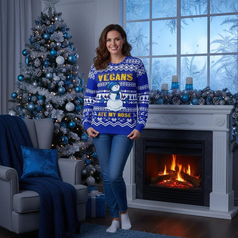Woman in Christmas sweater with monochromatic blue theme