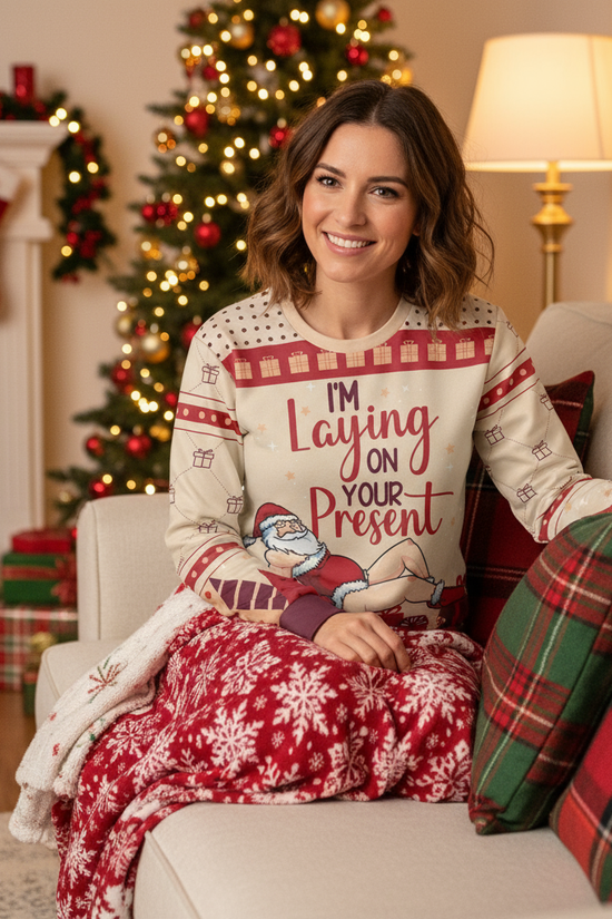 Woman in Christmas sweatshirt - Relaxing on sofa