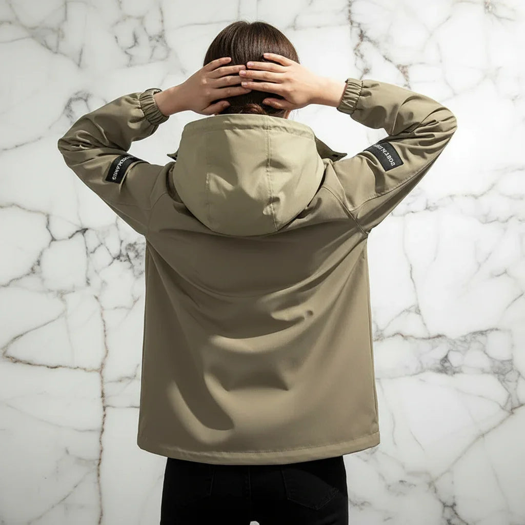 Woman in Khaki Jacket Back View Hands on Head