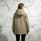 Woman in Khaki Jacket Straight Back View
