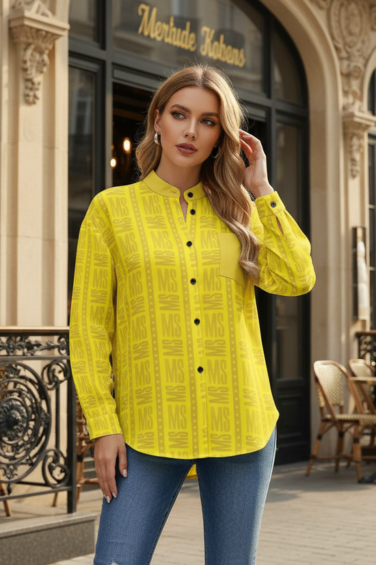 Woman in yellow shirt at café entrance