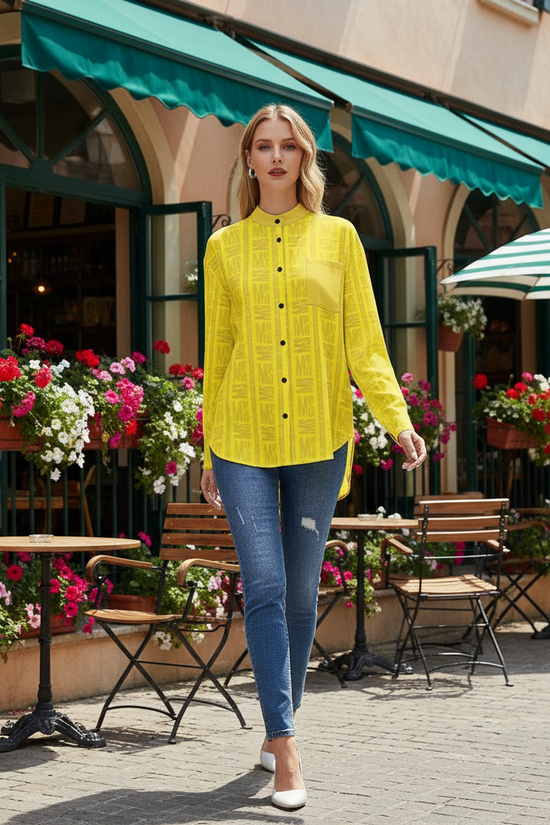 Woman in yellow shirt walking past café